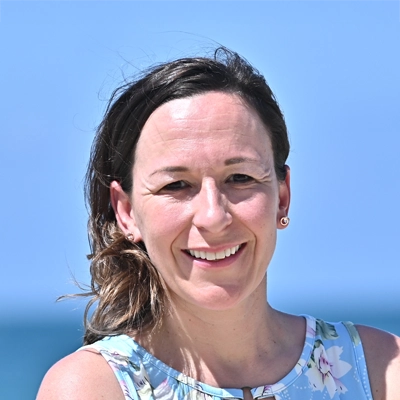 A headshot of Dr. Denise Carrel, a chiropractor at Carrel Chiropractic Clinic.